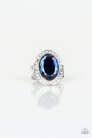 A dramatic blue gem is pressed into a round silver frame radiating with glassy white rhinestones for a statement-making finish. Features a stretchy band for a flexible fit.  Sold as one individual ring.