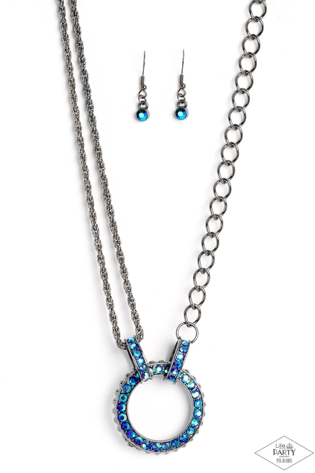 A collision of mismatched gunmetal chains gives way to a studded gunmetal pendant that has been encrusted in glittery blue UV rhinestones. The result is a gritty, industrial design with endless attitude. Features an adjustable clasp closure.  Sold as one individual necklace.  Includes one pair of matching earrings.