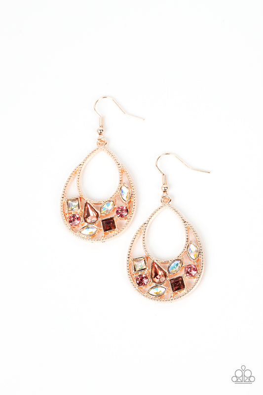 Featuring square, marquise, teardrop, and round cuts, an effervescent collection of pink and iridescent rhinestones delicately collects along the bottom of a studded rose gold teardrop for a bubbly finish. Earring attaches to a standard fishhook fitting.  Sold as one pair of earrings.