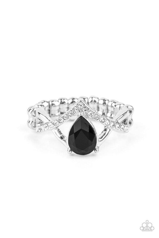A glittery black rhinestone teardrop is nestled atop an arcing silver band encrusted in glassy white rhinestones, creating an elegant centerpiece atop the finger. Features a dainty stretchy band for a flexible fit.  Sold as one individual ring.