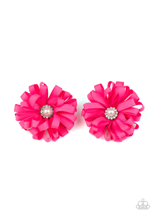 Dotted with pearl-drop and white rhinestone centers, textured pink ribbon curls into a pair of springy blossoms. Each flower features a standard hair clip on the back.  Sold as one pair of hair clips.