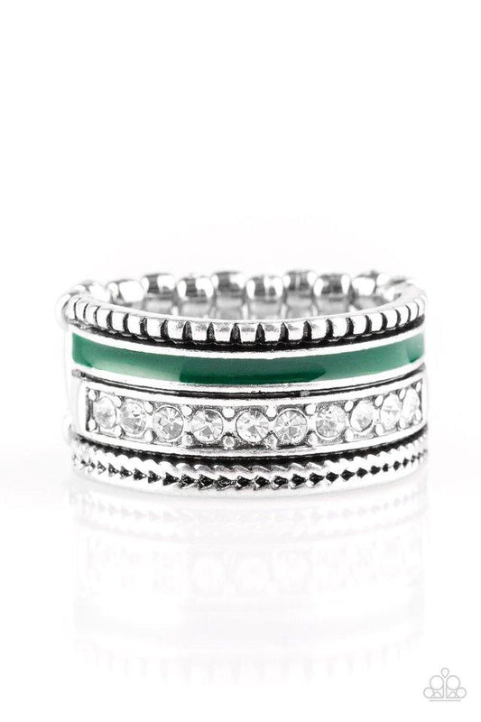 Tinted in the rich shade of Quetzal green, a strip of color runs along the bottom of a row of glassy white&nbsp;rhinestones. Infused with silver textures, the mismatched details coalesce into one thick band across the finger. Features a stretchy band for a flexible fit.  Sold as an indivdual ring,