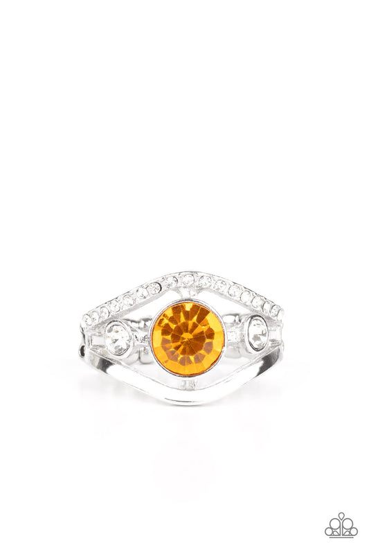 A white rhinestone encrusted band and glistening silver band wave around a radiating yellow and white rhinestone center for a refined look. Features a dainty stretchy band for a flexible fit.  Sold as one individual ring.