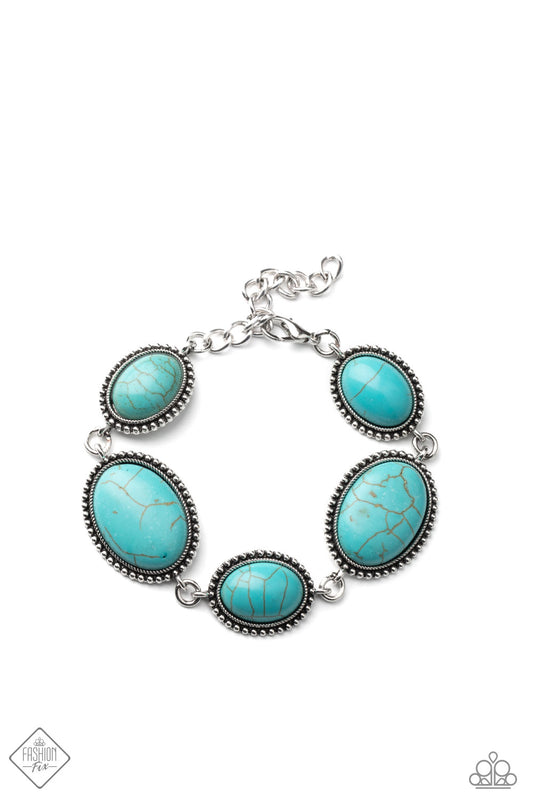 A collection of smoothly polished turquoise stones are pressed into studded oval silver frames that delicately link across the wrist for a colorfully rustic look.  Sold as one individual bracelet.