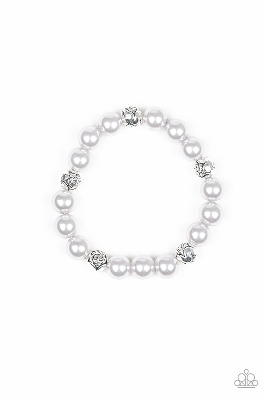 A collection of pearly silver beads and floral silver beads are threaded along an elastic band around the wrist for a refined fashion.

Sold as one individual bracelet.