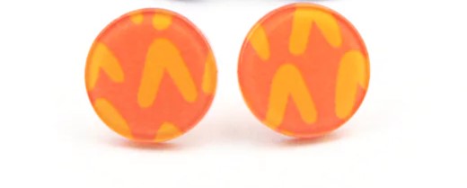 Kid's round button shaped earrings with orange background and darker orange hearts