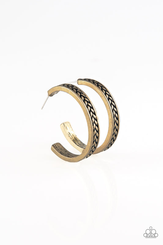 Featuring a rope-like pattern, a shimmery brass hoop curls around the ear for a casual look. Earring attaches to a standard post fitting. Hoop measures 1 1/4" in diameter.  Sold as one pair of hoop earrings.