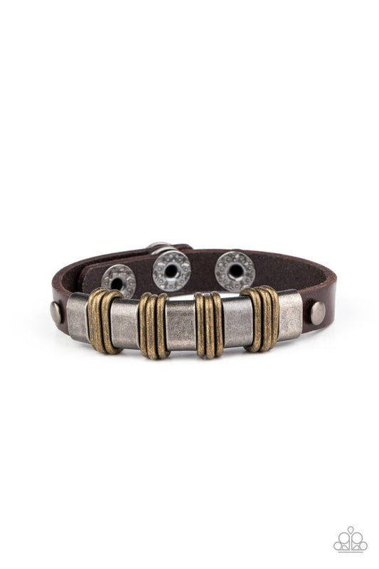 Trios of brass links are held in place with antiqued gunmetal fittings along a rustic brown leather band for an edgy urban look. Features an adjustable snap closure.  Sold as one individual bracelet.