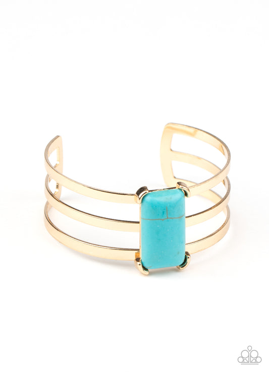 Chiseled into a sleek rectangle, a refreshing turquoise stone is pressed into the center of a gold layered cuff for a seasonal flair.  Sold as one individual bracelet.