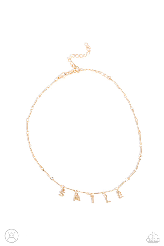 Separated by dainty gold rods, gold letters spell out the word SMILE in a soft, and simple manner. Features an adjustable clasp closure.  Sold as one individual choker necklace. Includes one pair of matching earrings.