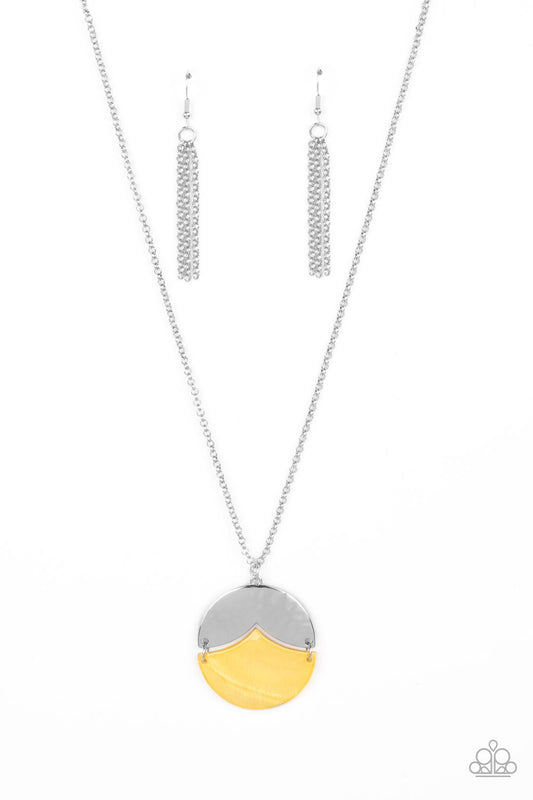 Featuring a scalloped cut, a hammered silver frame sits atop a matching cut Daffodil shell-like frame, creating a summery pendant at the bottom of an extended silver chain. Features an adjustable clasp closure.  Sold as one individual necklace. Includes one pair of silver fringe earrings.