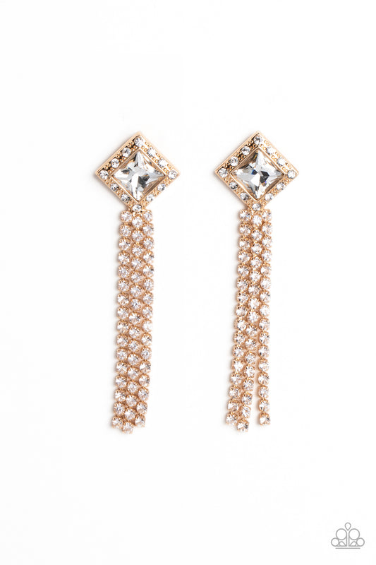 A brilliant, square-cut white rhinestone is bordered by tiny sparkling accents and tilted on a point against a gold backdrop, creating a dramatic anchoring point from which streams of glittery, square-cut rhinestones cascade from the ear in a glitzy finish. Earring attaches to a standard post fitting.  Sold as one pair of post earrings.
