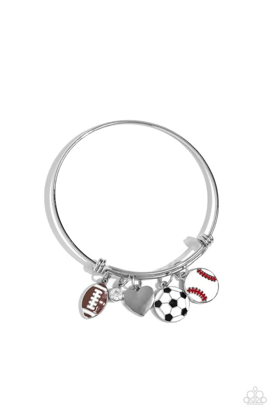 Featuring a sporty motif, a silver heart, solitaire white rhinestone, and football, soccer ball, and baseball charms swing from a silver bangle-like bracelet attached to a sleek silver fitting for a spirited finish.  Sold as one individual bracelet.