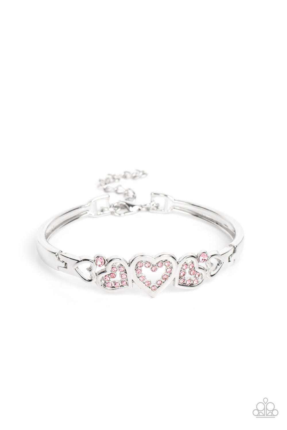 Mismatched silver heart frames flirtatiously coalesce into a charming centerpiece that delicately hinges to two curving silver frames, resulting in a versatile cuff-like bracelet. Glittery pink rhinestones twinkle inside the centermost hearts, adding romantic hints of sparkle. Features an adjustable clasp closure.  Sold as one individual bracelet.
