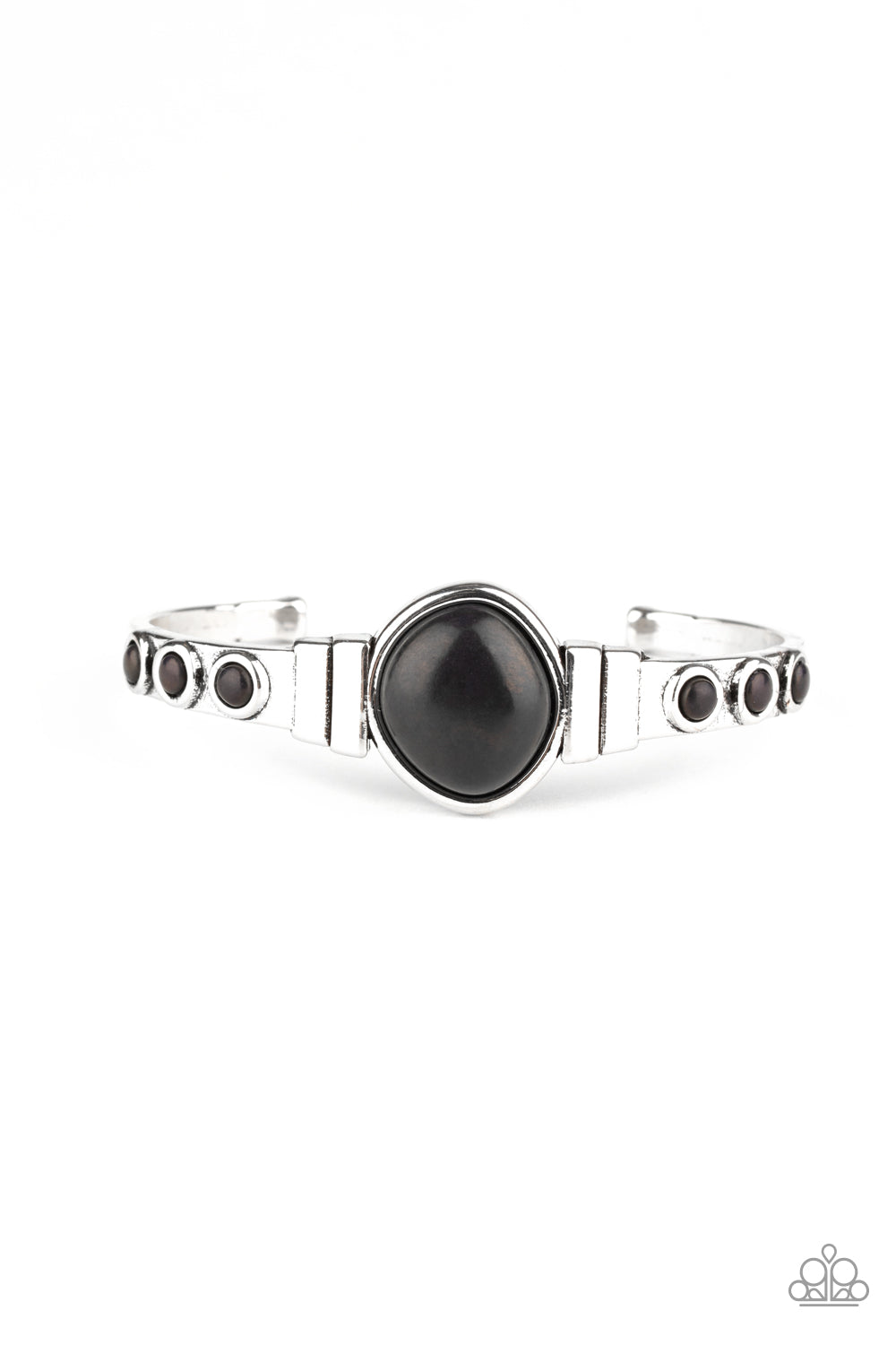 Dotted in dainty black stones, a dainty silver cuff attaches to an asymmetrical black stone centerpiece for an earthy flair.  Sold as one individual bracelet.