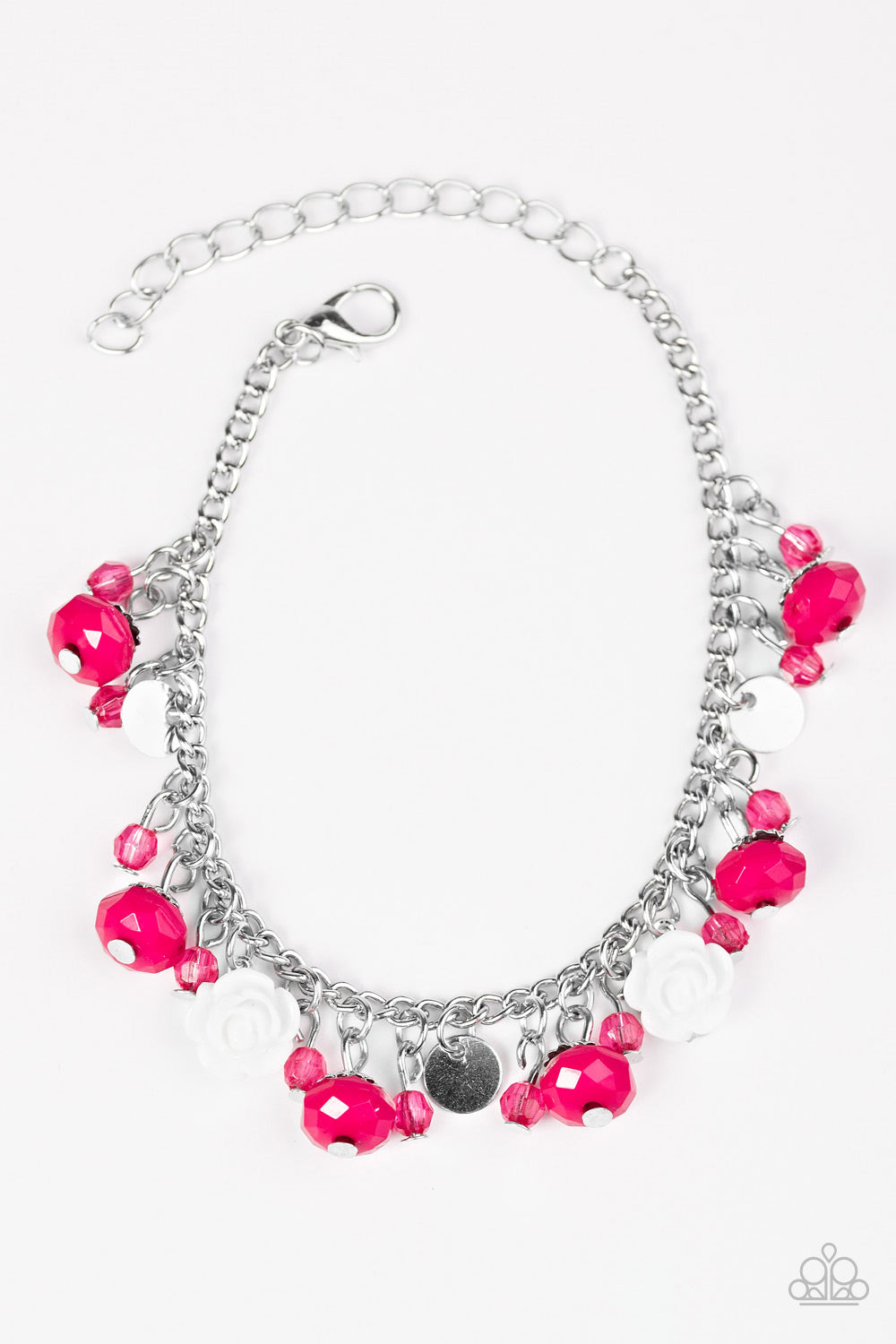 Tinted in the vivacious hue of Love Potion, faceted pink beads swing from the wrist in a flirtatious fashion. Infused with dainty crystal-like accents and shiny silver discs, white resin roses trickle between the colorful beading for a feminine finish. Features an adjustable clasp closure.

Sold as one individual bracelet.