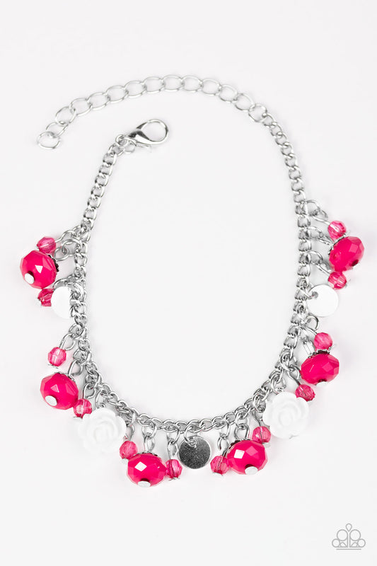 Tinted in the vivacious hue of Love Potion, faceted pink beads swing from the wrist in a flirtatious fashion. Infused with dainty crystal-like accents and shiny silver discs, white resin roses trickle between the colorful beading for a feminine finish. Features an adjustable clasp closure.

Sold as one individual bracelet.