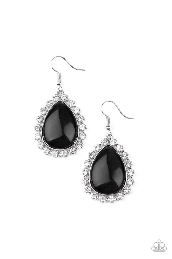 Glassy white rhinestones encircle a glowing black cat's eye stone teardrop, creating an elegant frame. Earring attaches to a standard fishhook fitting.  Sold as one pair of earrings.