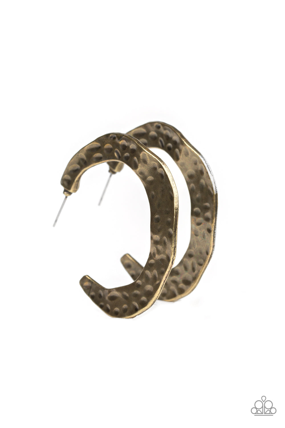 Radiating with hammered detail, an asymmetrical brass hoop curls around the ear for a casual look. Earring attaches to a standard post fitting. Hoop measures 2" in diameter.  Sold as one pair of hoop earrings.